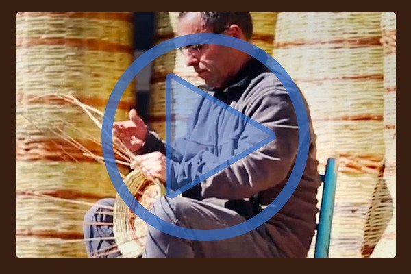 Winner of the Elita Milan Design Award competition: Antonio Marras for Segno Italiano. Shown is a worker creating baskets by hand for the winning exhibition "The Path to the Nest of Spiders"